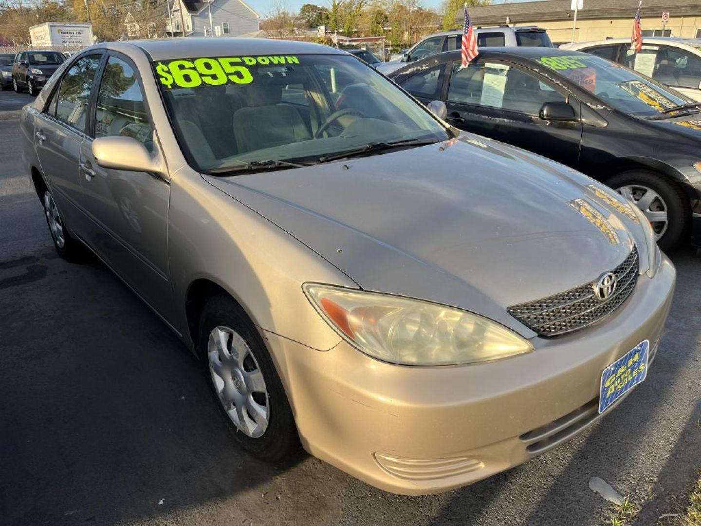 2004 TAN TOYOTA CAMRY LE (4T1BE32KX4U) with an 2.4L engine, Automatic transmission, located at 930 E Little Creek Road, Norfolk, VA, 23518, (757) 588-0420, 36.915051, -76.244408 - Photo#0