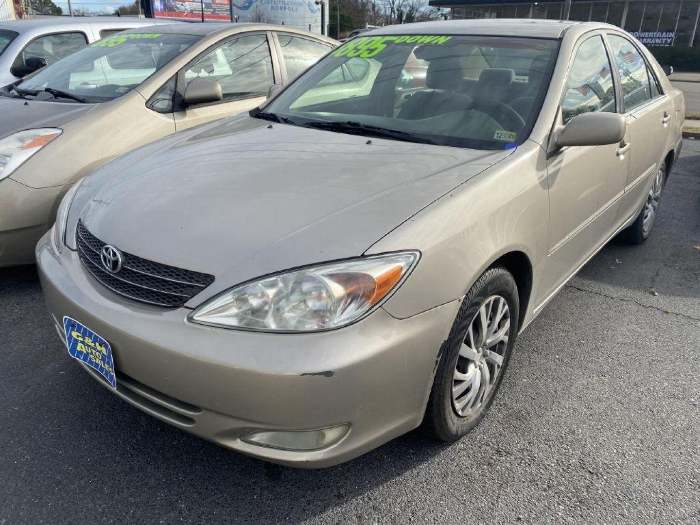 2004 GOLD TOYOTA CAMRY LE (4T1BE30KX4U) with an 2.4L engine, Automatic transmission, located at 930 E Little Creek Road, Norfolk, VA, 23518, (757) 588-0420, 36.915051, -76.244408 - Photo#0