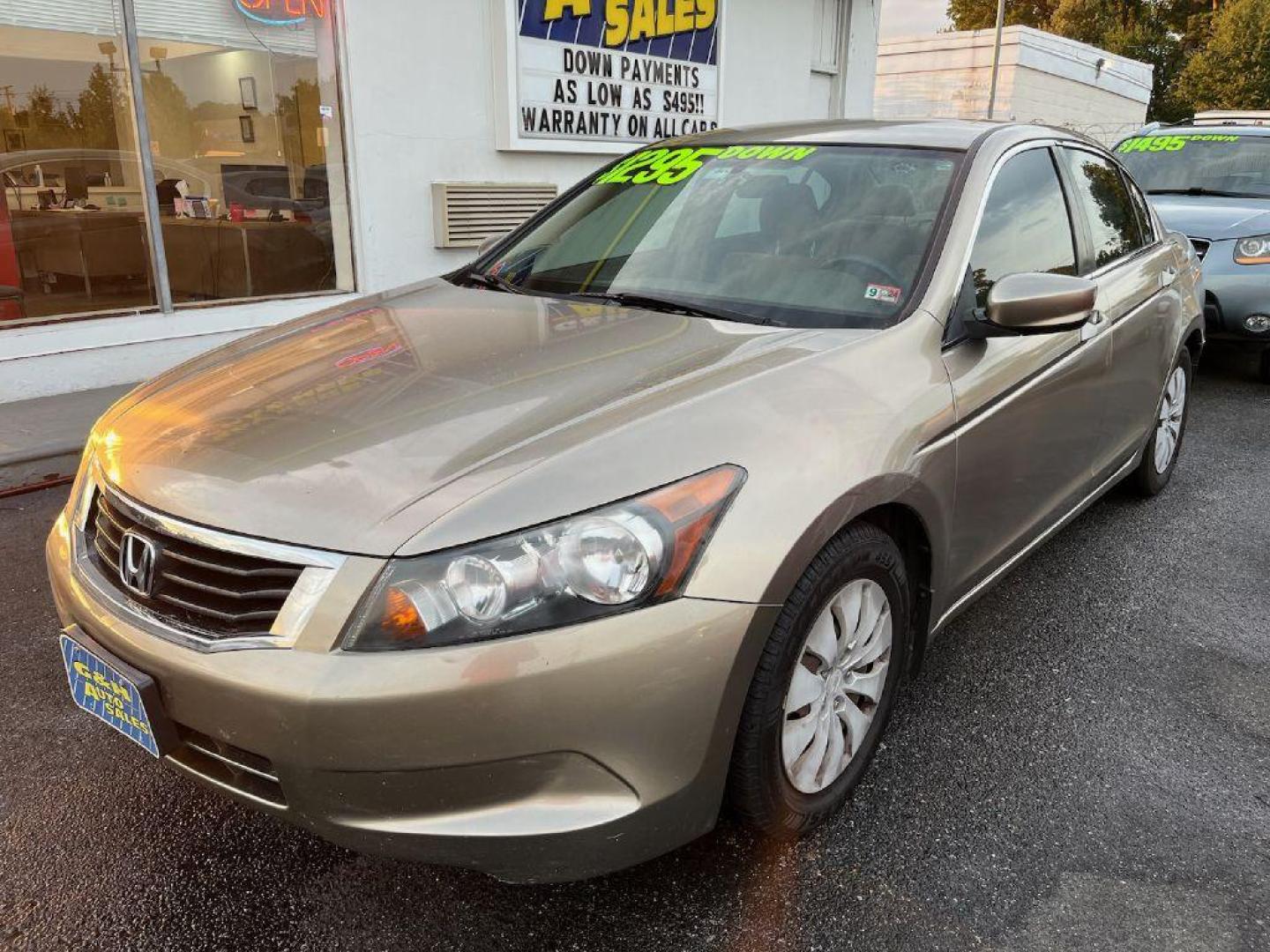 2009 GOLD HONDA ACCORD LX (JHMCP26369C) with an 2.4L engine, Automatic transmission, located at 930 E Little Creek Road, Norfolk, VA, 23518, (757) 588-0420, 36.915051, -76.244408 - Photo#0