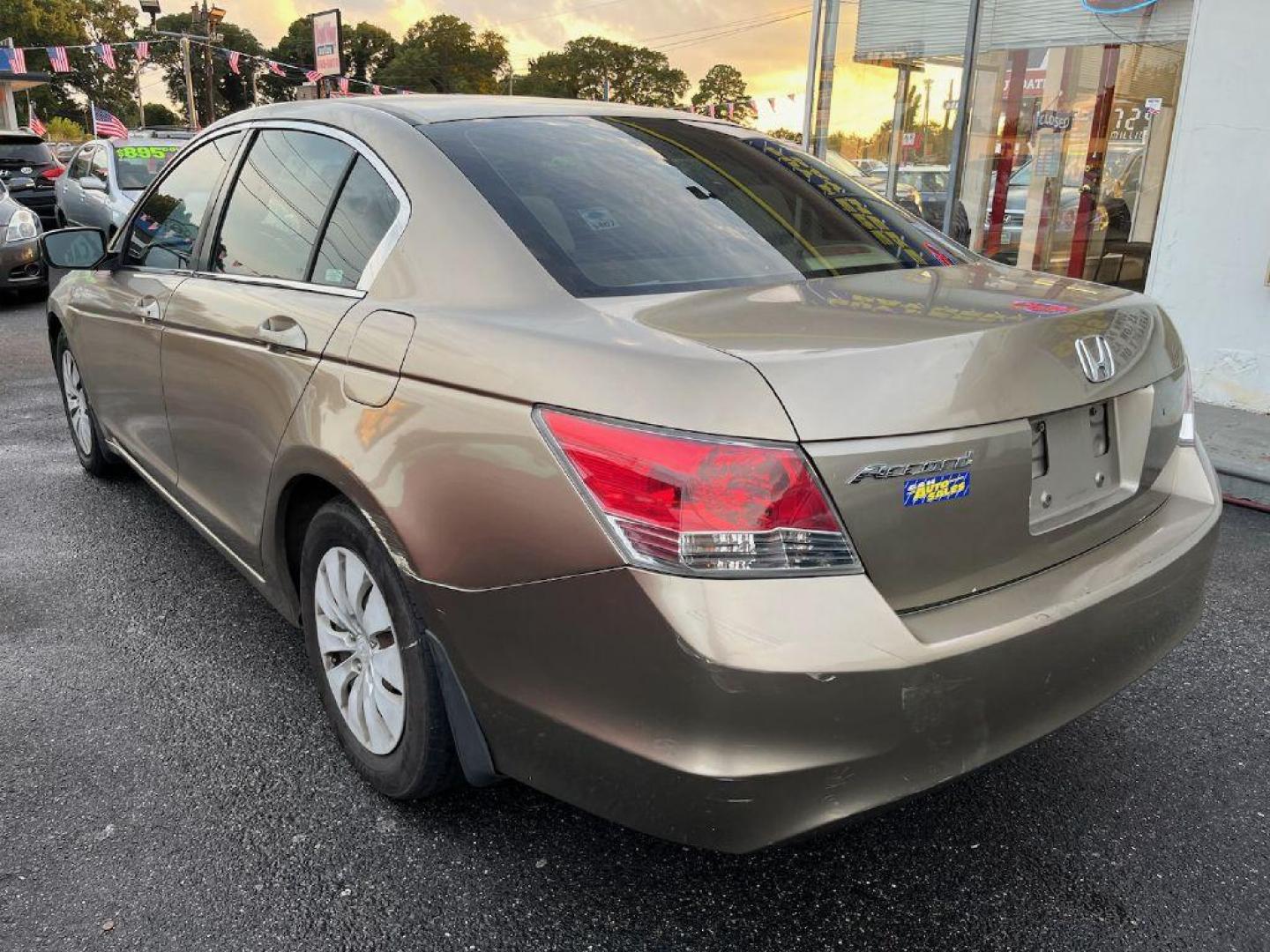 2009 GOLD HONDA ACCORD LX (JHMCP26369C) with an 2.4L engine, Automatic transmission, located at 930 E Little Creek Road, Norfolk, VA, 23518, (757) 588-0420, 36.915051, -76.244408 - Photo#3