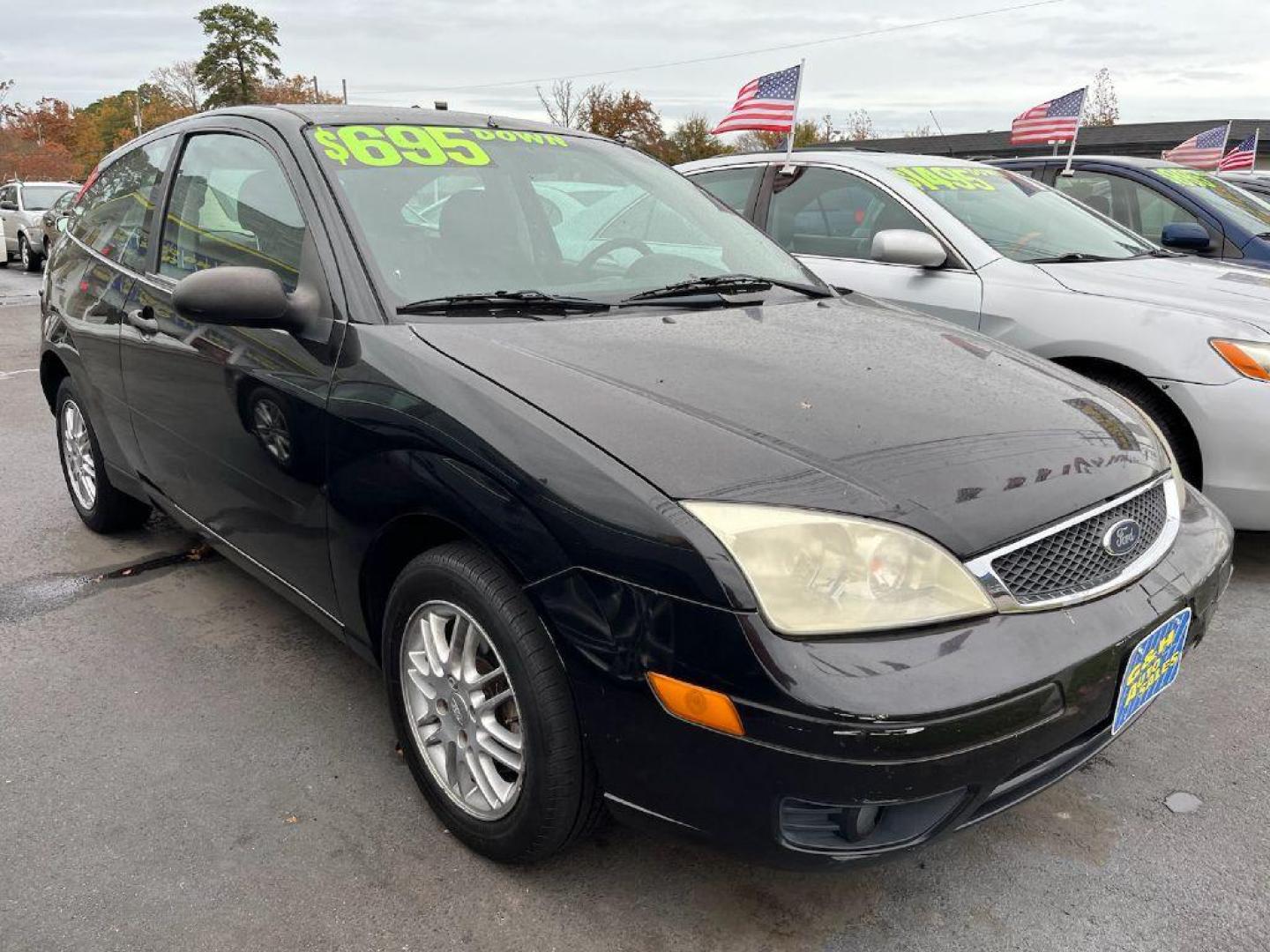 2007 BLACK FORD FOCUS ZX3 (1FAFP31N67W) with an 2.0L engine, Automatic transmission, located at 930 E Little Creek Road, Norfolk, VA, 23518, (757) 588-0420, 36.915051, -76.244408 - Photo#0