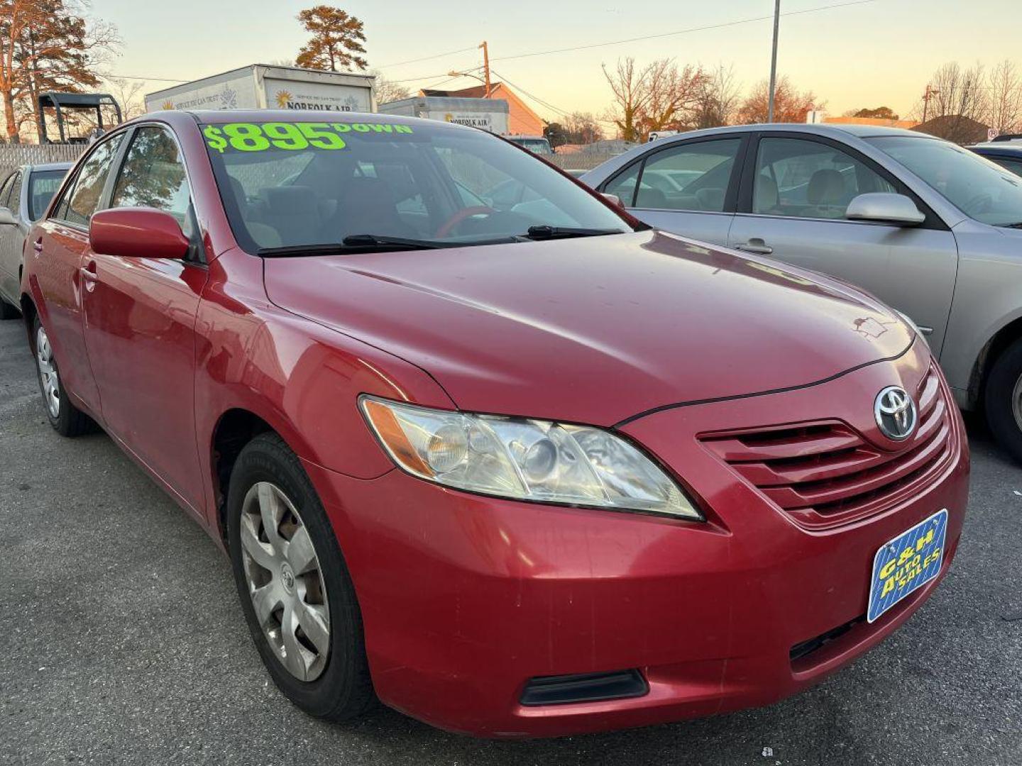 2007 RED TOYOTA CAMRY CE (4T1BE46KX7U) with an 2.4L engine, Automatic transmission, located at 930 E Little Creek Road, Norfolk, VA, 23518, (757) 588-0420, 36.915051, -76.244408 - Photo#0