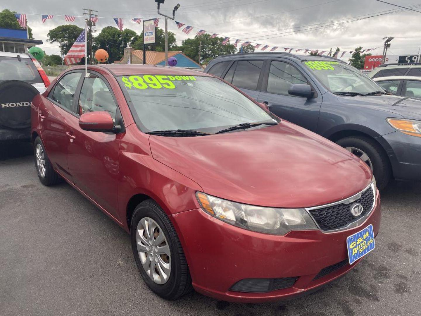 2011 RED KIA FORTE EX (KNAFU4A29B5) with an 2.0L engine, Automatic transmission, located at 930 E Little Creek Road, Norfolk, VA, 23518, (757) 588-0420, 36.915051, -76.244408 - Photo#0