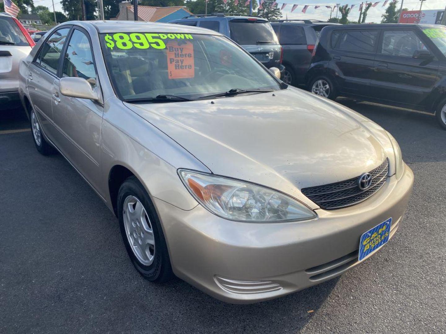 2003 GOLD TOYOTA CAMRY LE (4T1BF30K63U) with an 3.0L engine, Automatic transmission, located at 930 E Little Creek Road, Norfolk, VA, 23518, (757) 588-0420, 36.915051, -76.244408 - Photo#0