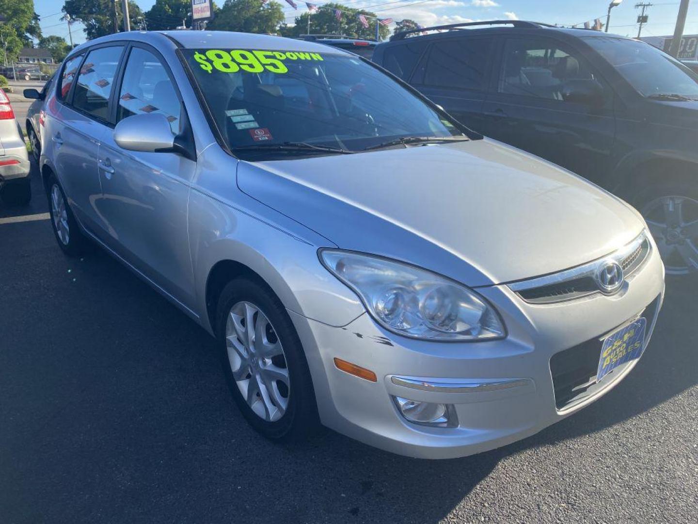 2009 SILVER HYUNDAI ELANTRA TOURING (KMHDC86E09U) with an 2.0L engine, Automatic transmission, located at 930 E Little Creek Road, Norfolk, VA, 23518, (757) 588-0420, 36.915051, -76.244408 - Photo#0