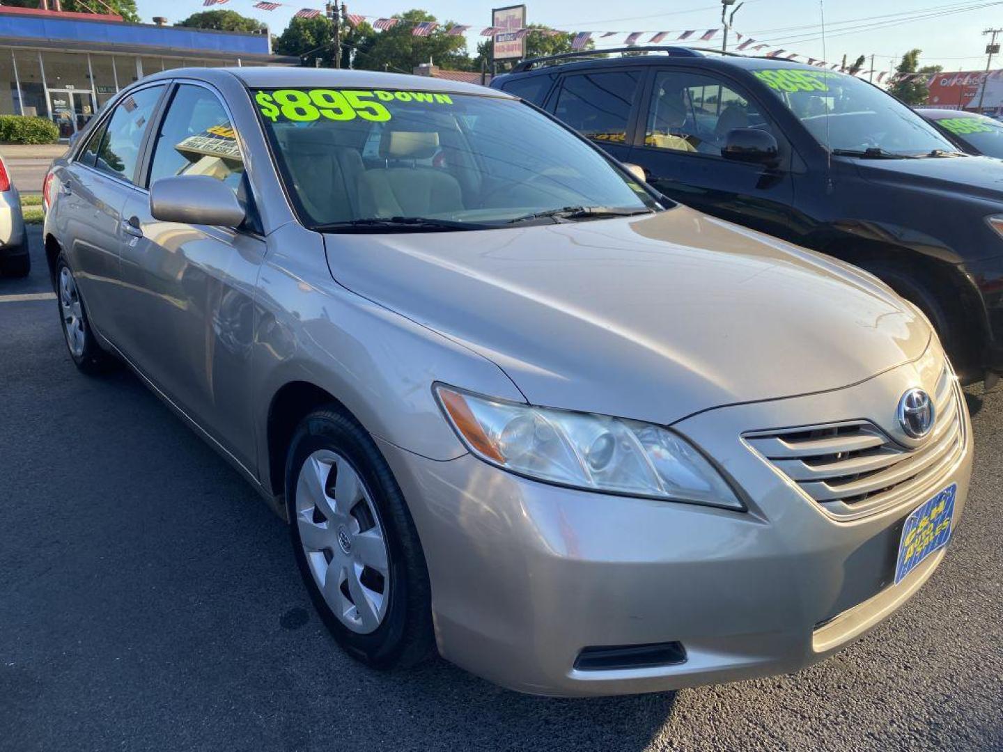 2007 GOLD TOYOTA CAMRY CE (4T1BE46K97U) with an 2.4L engine, Automatic transmission, located at 930 E Little Creek Road, Norfolk, VA, 23518, (757) 588-0420, 36.915051, -76.244408 - Photo#0