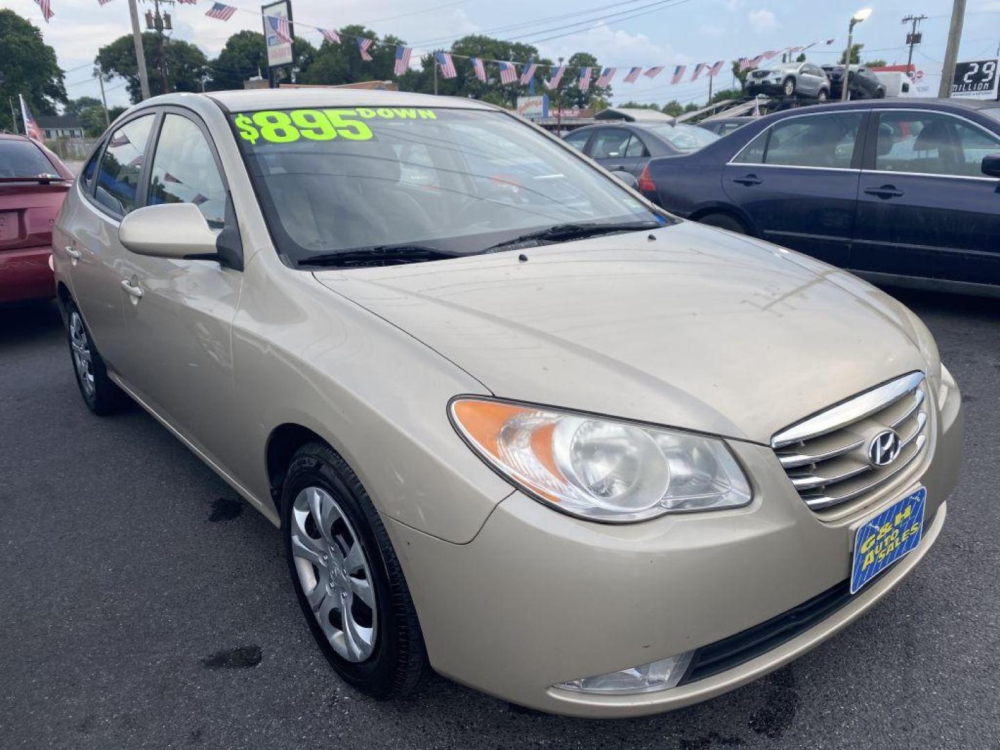 2010 GOLD HYUNDAI ELANTRA BLUE (KMHDU4AD7AU) with an 2.0L engine, Automatic transmission, located at 930 E Little Creek Road, Norfolk, VA, 23518, (757) 588-0420, 36.915051, -76.244408 - Photo#0