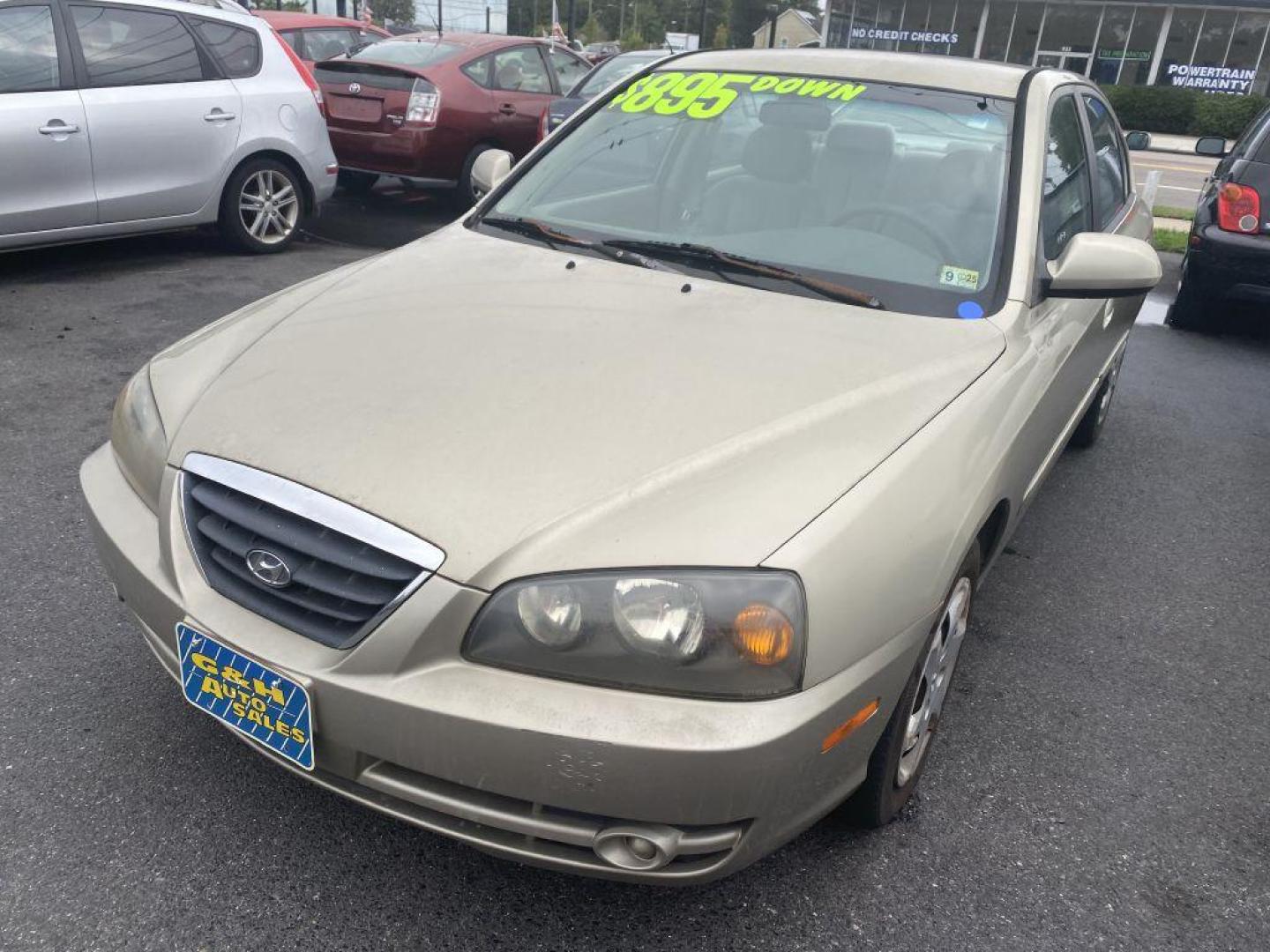 2005 TAN HYUNDAI ELANTRA GLS (KMHDN46D65U) with an 2.0L engine, Automatic transmission, located at 930 E Little Creek Road, Norfolk, VA, 23518, (757) 588-0420, 36.915051, -76.244408 - Photo#0