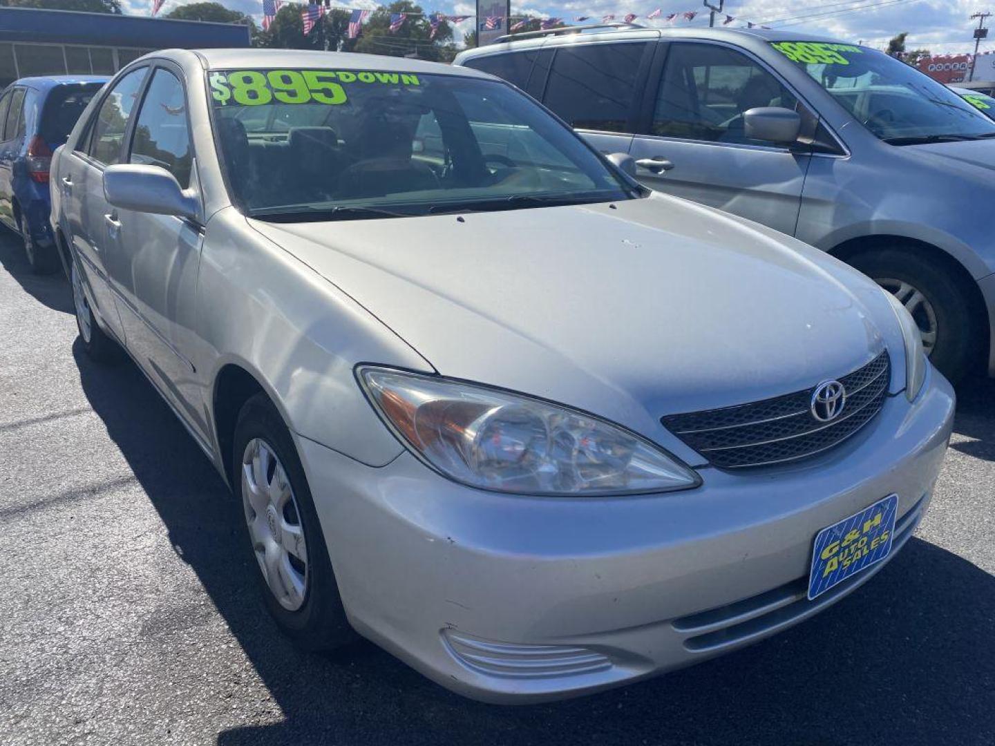 2004 SILVER TOYOTA CAMRY LE (4T1BE32KX4U) with an 2.4L engine, Automatic transmission, located at 930 E Little Creek Road, Norfolk, VA, 23518, (757) 588-0420, 36.915051, -76.244408 - Photo#0