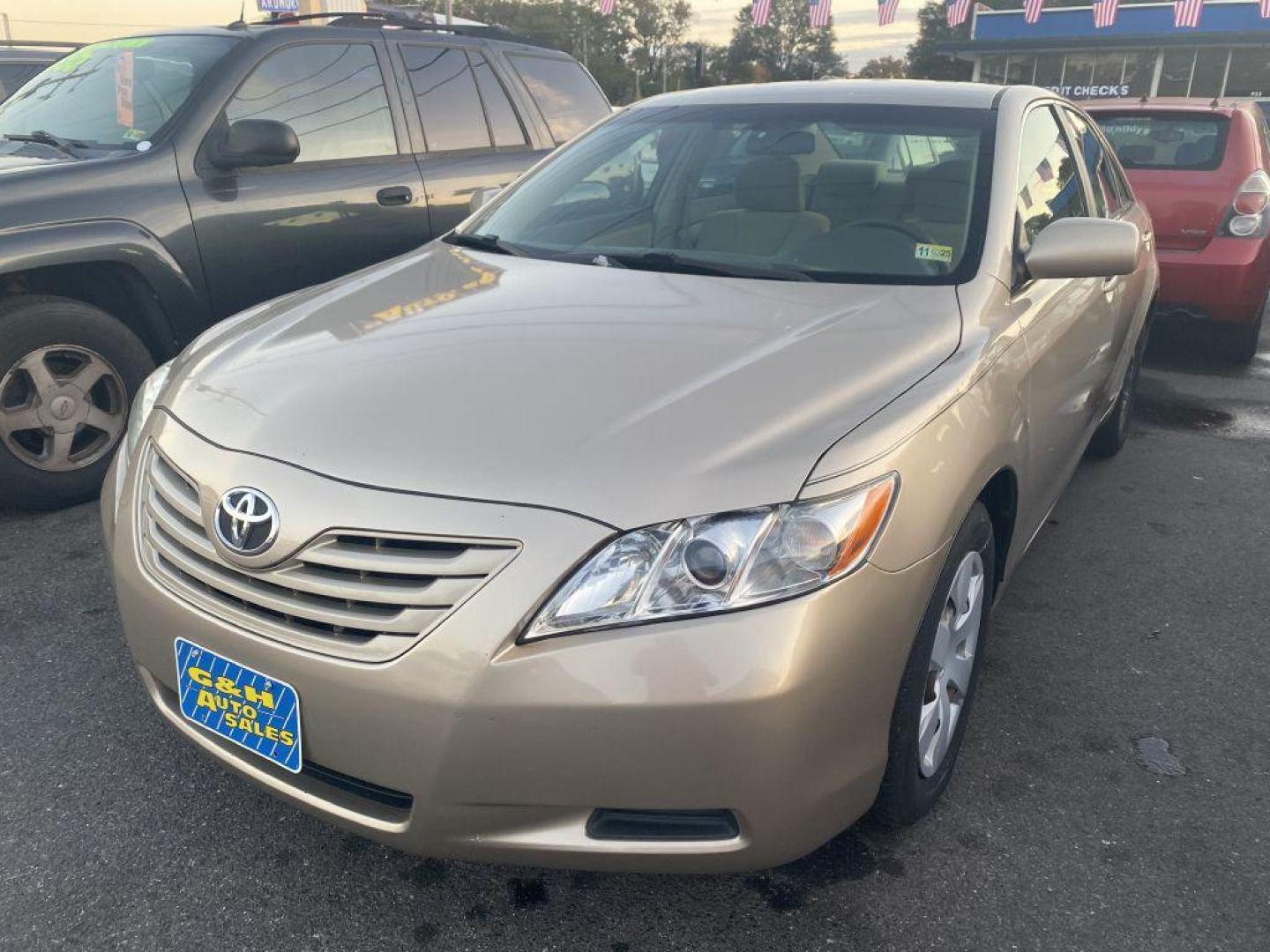 2007 GOLD TOYOTA CAMRY CE (4T1BE46K27U) with an 2.4L engine, Automatic transmission, located at 930 E Little Creek Road, Norfolk, VA, 23518, (757) 588-0420, 36.915051, -76.244408 - Photo#0