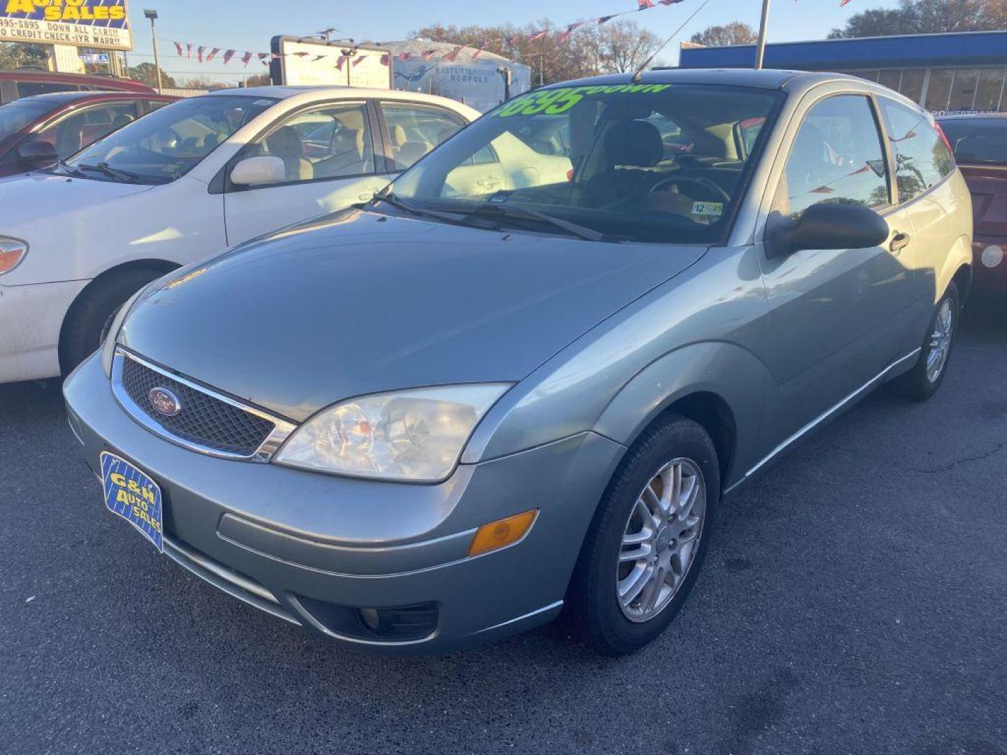 2006 GREEN FORD FOCUS ZX3 (1FAHP31N96W) with an 2.0L engine, Automatic transmission, located at 930 E Little Creek Road, Norfolk, VA, 23518, (757) 588-0420, 36.915051, -76.244408 - Photo#0