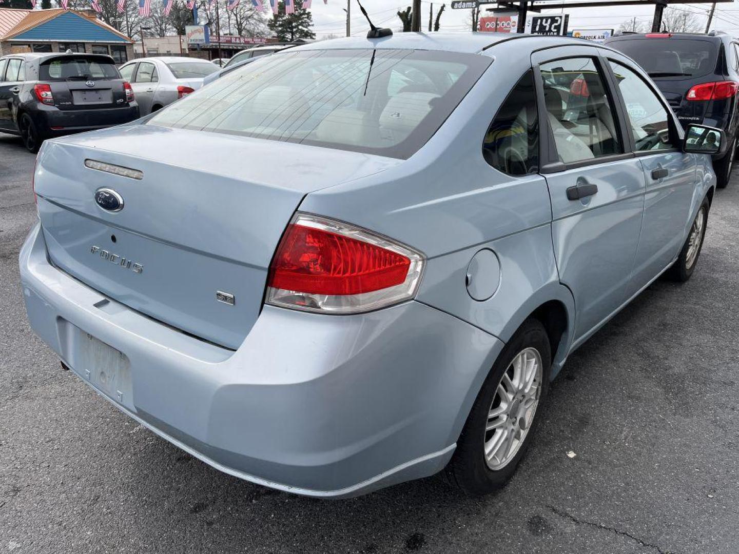 2009 BLUE FORD FOCUS SE (1FAHP35N29W) with an 2.0L engine, Automatic transmission, located at 930 E Little Creek Road, Norfolk, VA, 23518, (757) 588-0420, 36.915051, -76.244408 - Photo#3