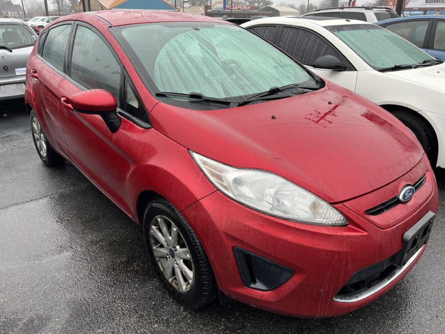 2011 RED FORD FIESTA SE (3FADP4EJ8BM) with an 1.6L engine, 6-Speed Manual transmission, located at 930 E Little Creek Road, Norfolk, VA, 23518, (757) 588-0420, 36.915051, -76.244408 - Photo#0